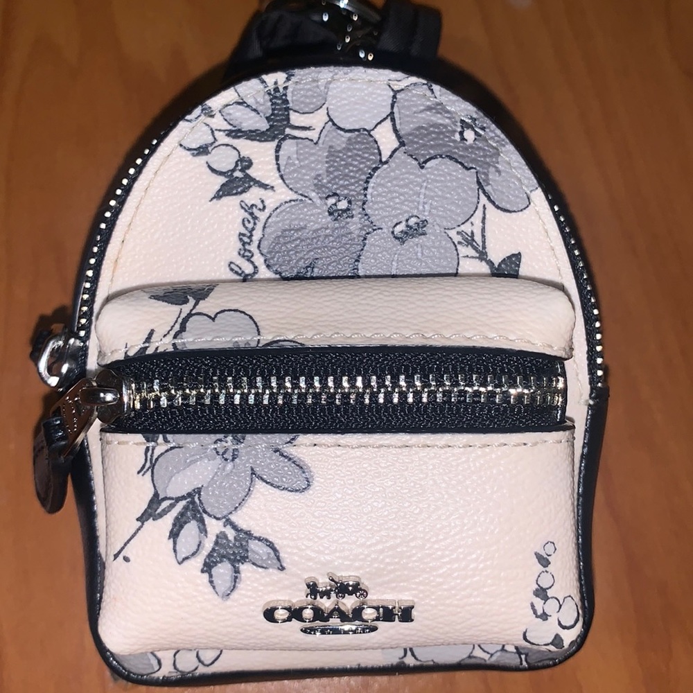 Coach mini backpack.  Floral print NWT clean